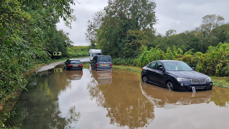 Cars stranded in flood water