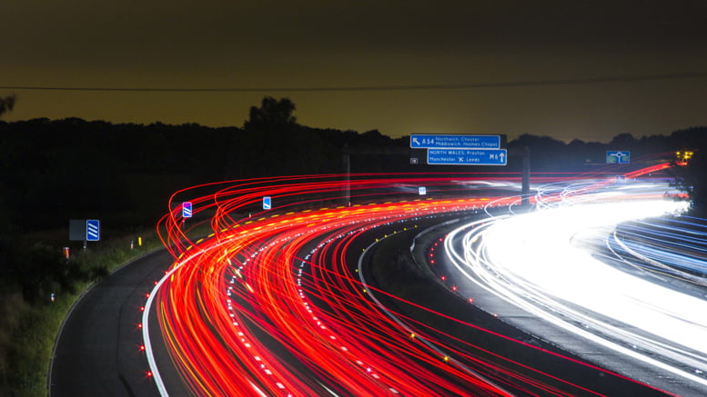 del;ayed-shutter stock photo showing vehicle light trails on a motorway