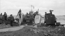 An action photo of landing craft landing on Jig Beach on D-Day1