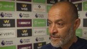 Nottingham Forest manager Nuno Espírito Santo in front of a board with sponsors logos