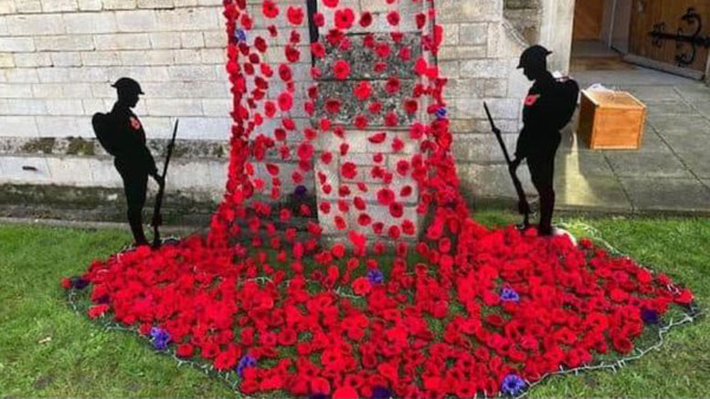 Artwork depicting silhouettes of “Tommys” and a net of poppies